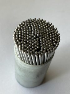 dozens of specialty diamond tools kept in a small plastic cup